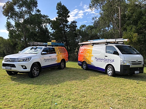 The Phantom Electrical team and service vehicles — Melbourne-based electrical contractors operating since 2011